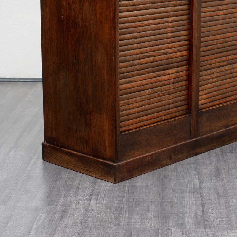 Vintage roller shutter cabinet in dark oak - 1940s