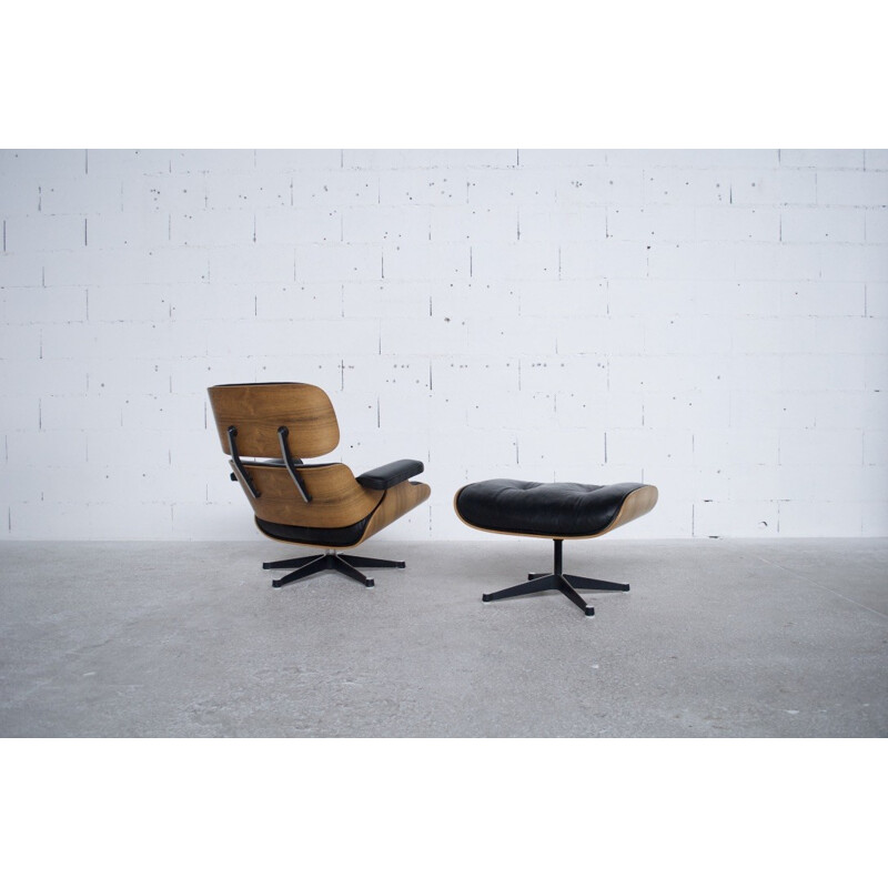 Black Lounge chair and ottoman in rosewood by Charles Eames - 1991