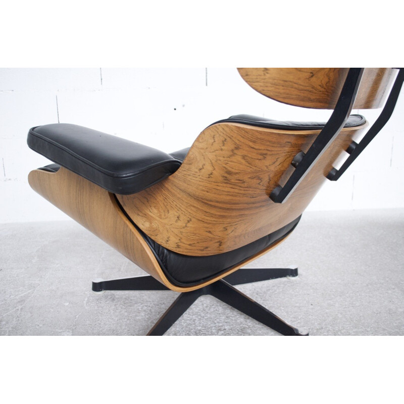 Black Lounge chair and ottoman in rosewood by Charles Eames - 1991