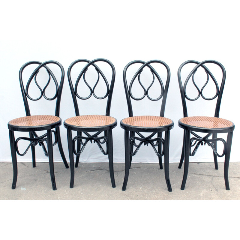 Suite de 4 chaises en bois laqué noir - 1960