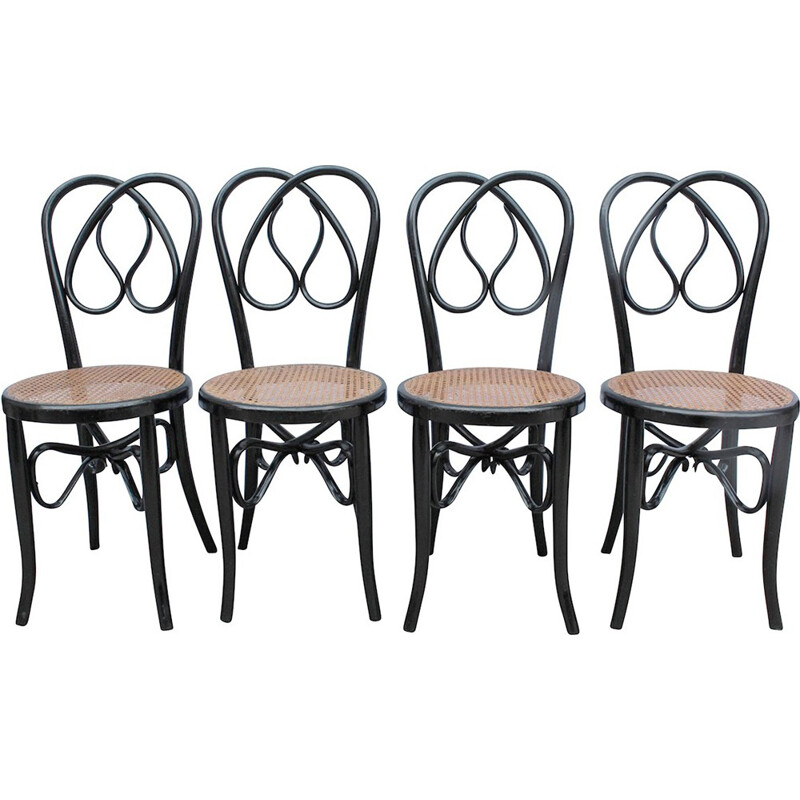 Suite de 4 chaises en bois laqué noir - 1960