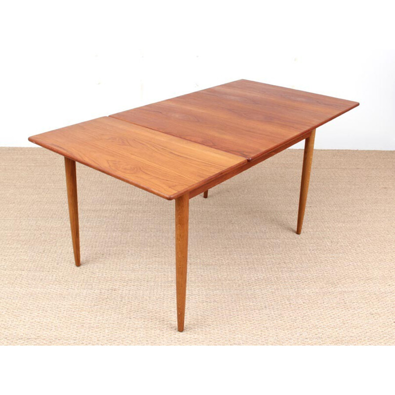 Extendable dining table in teak and oak - 1950s