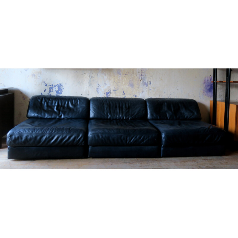 Suite de 3 fauteuils D 76 en cuir noir vintage de De Sede - 1970