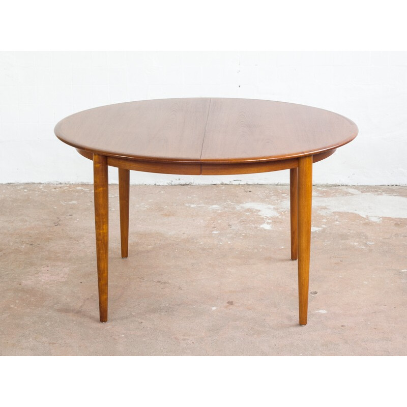 Danish round table in teak with 2 extension plates - 1960s