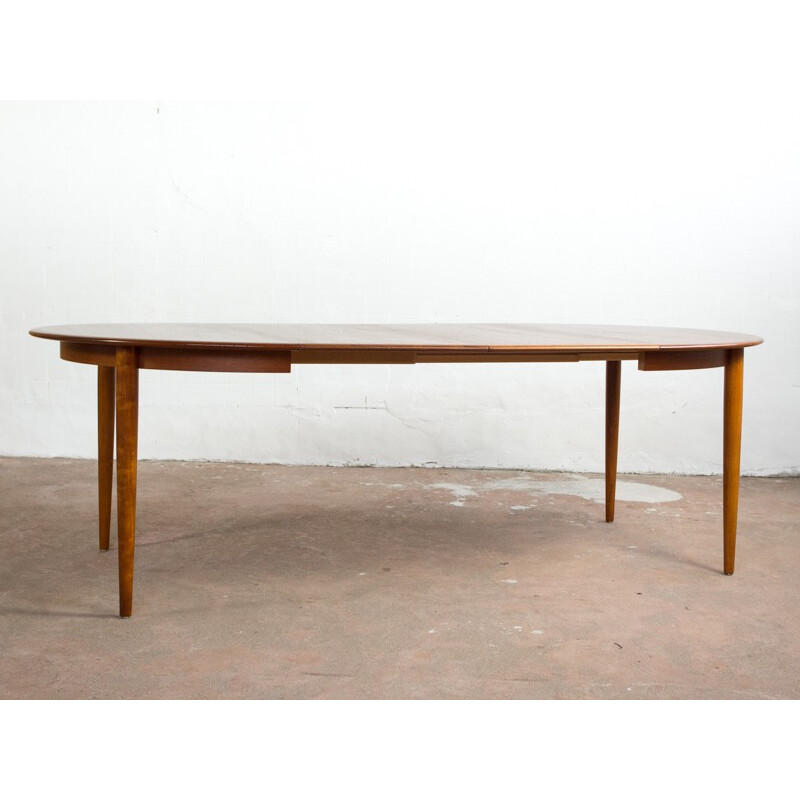 Danish round table in teak with 2 extension plates - 1960s