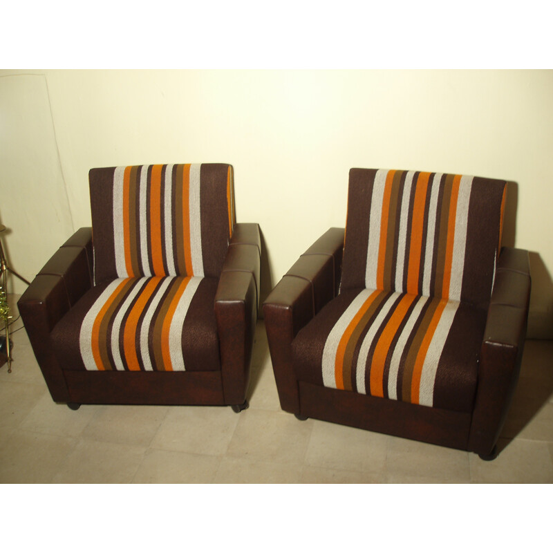 A pair of mid-century armchairs in leatherette - 1970s