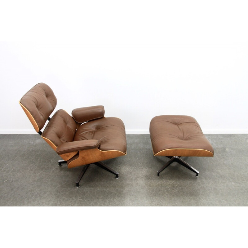 Brown Leather And Walnut Lounge Chair And Ottoman by Eames - 1970s
