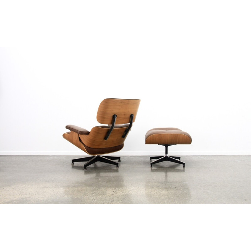 Brown Leather And Walnut Lounge Chair And Ottoman by Eames - 1970s