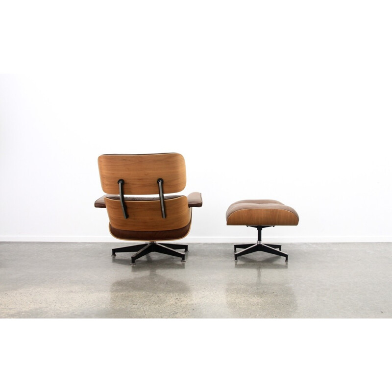 Brown Leather And Walnut Lounge Chair And Ottoman by Eames - 1970s