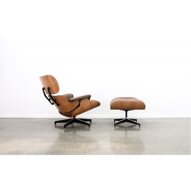 Brown Leather And Walnut Lounge Chair And Ottoman by Eames - 1970s