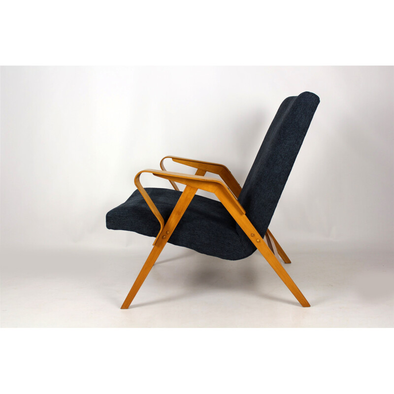 Vintage armchair in wood by Tatra - 1960s