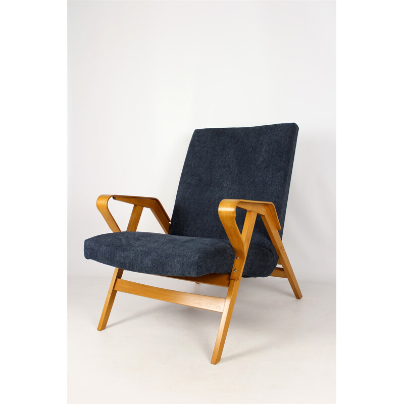 Vintage armchair in wood by Tatra - 1960s