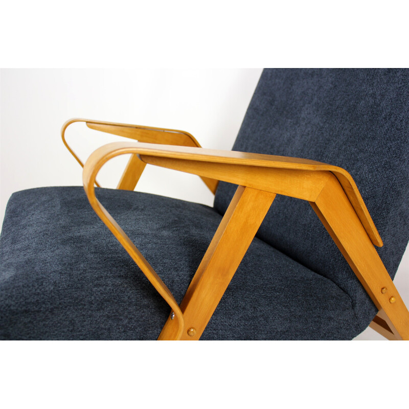 Vintage armchair in wood by Tatra - 1960s