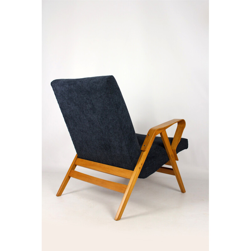 Vintage armchair in wood by Tatra - 1960s