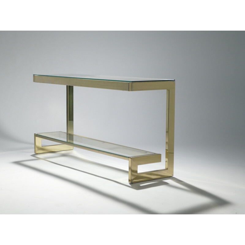 Asymetrical brass and glass side table by Guy Lefevre for Maison Jansen - 1970s