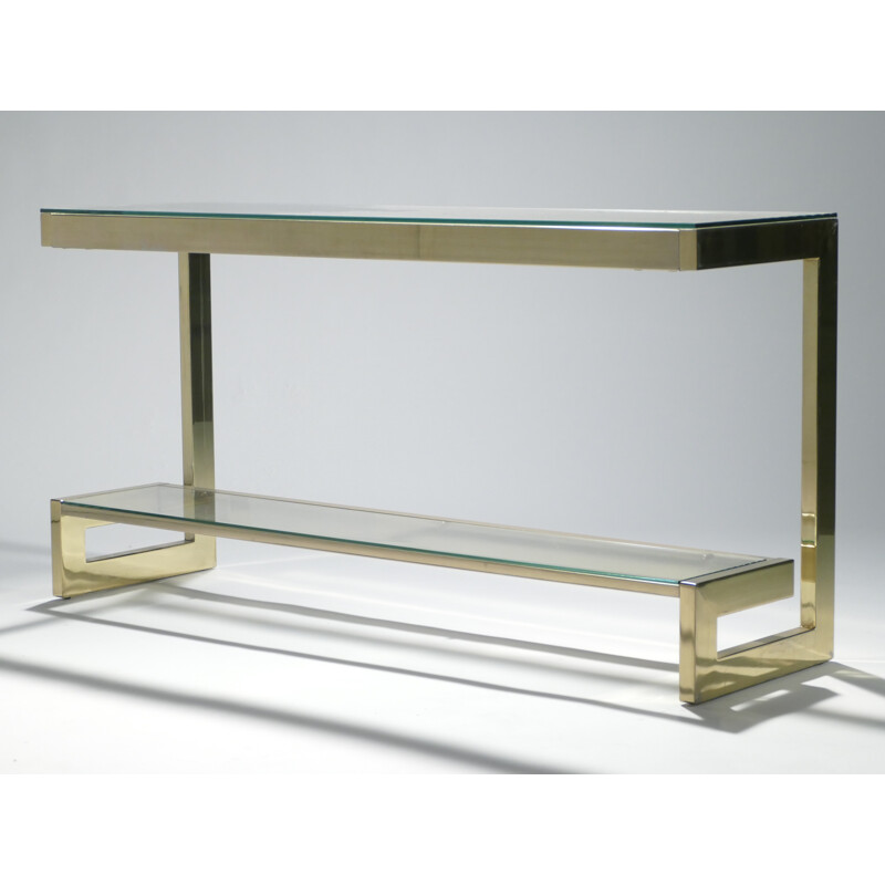 Asymetrical brass and glass side table by Guy Lefevre for Maison Jansen - 1970s