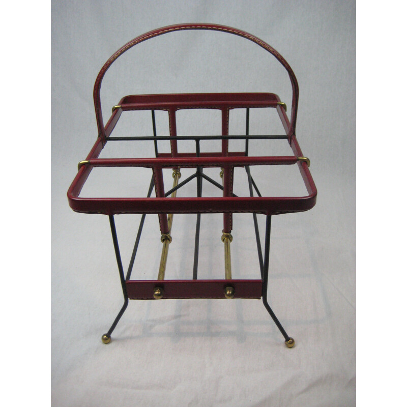 Magazine rack by Jacques Adnet - 1950s