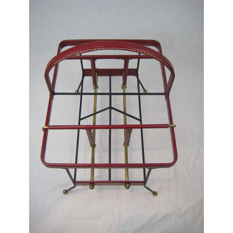 Magazine rack by Jacques Adnet - 1950s