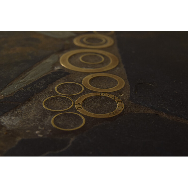 Brutalist coffee table in stone and brass by Paul Kingma - 1970s