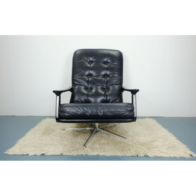 Fauteuil Lounge pivotant en cuir - 1960