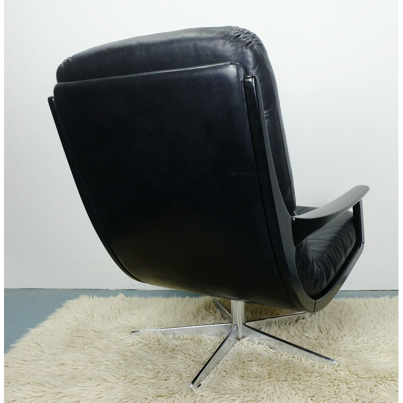 Fauteuil Lounge pivotant en cuir - 1960