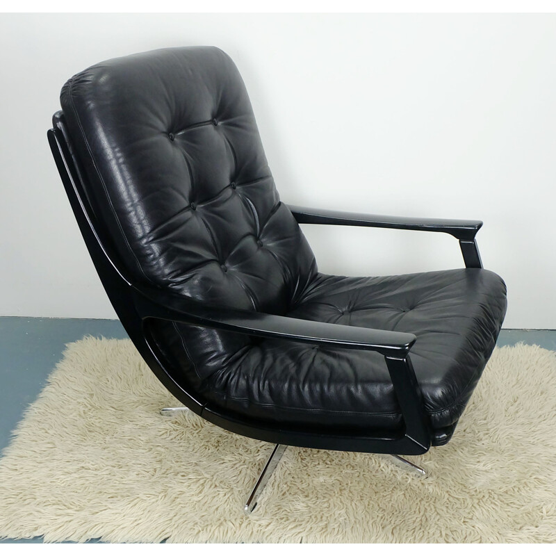 Fauteuil Lounge pivotant en cuir - 1960