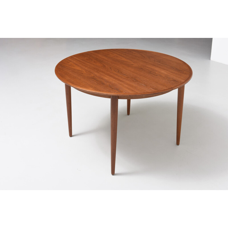 Round dining table in teak with 2 extensions - 1950s