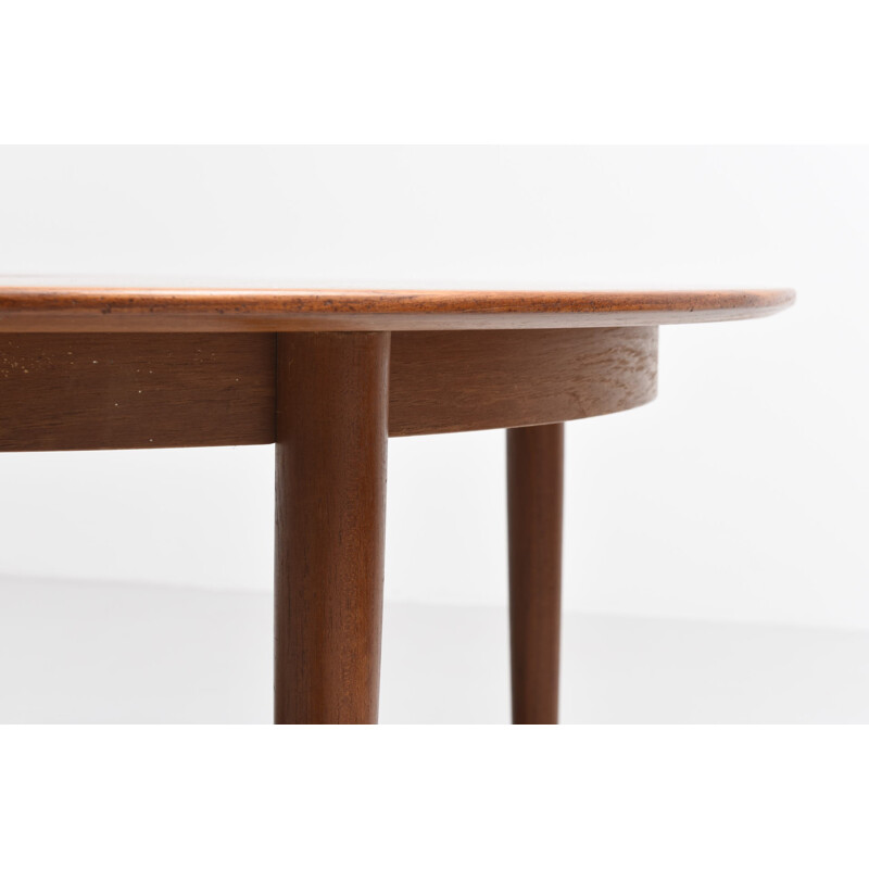 Table à repas ronde en teck avec 2 extensions - 1950