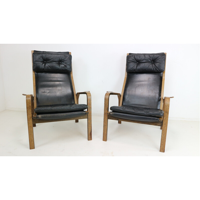 Pair of black leather armchairs by Yngve Ekstrom - 1960s