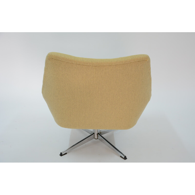 Fauteuil vintage coquille pivotant jaune - 1970