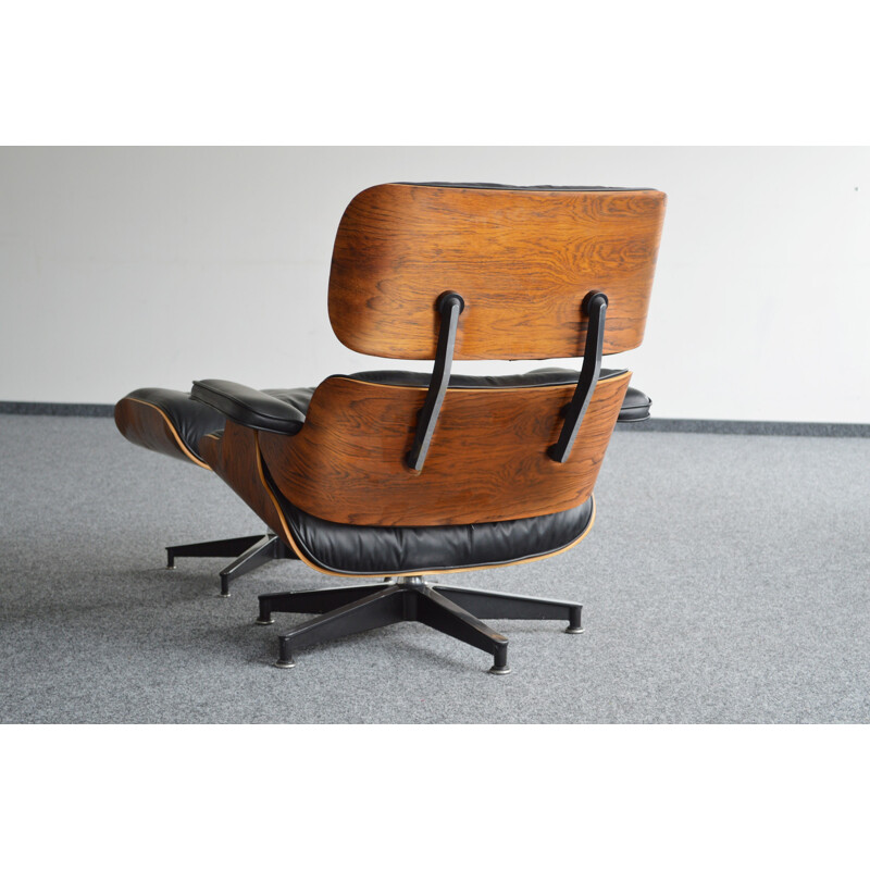 Fauteuil lounge Eames noir, palissandre, par Herman Miller - 1978