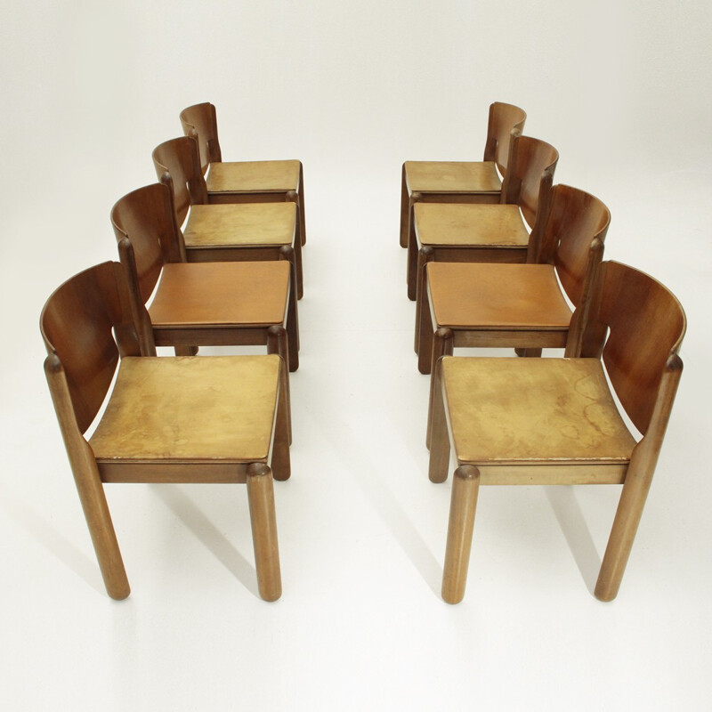 Suite de 8 chaises vintage modèle 122 avec siège en cuir par Vico Magistretti pour Cassina - 1960
