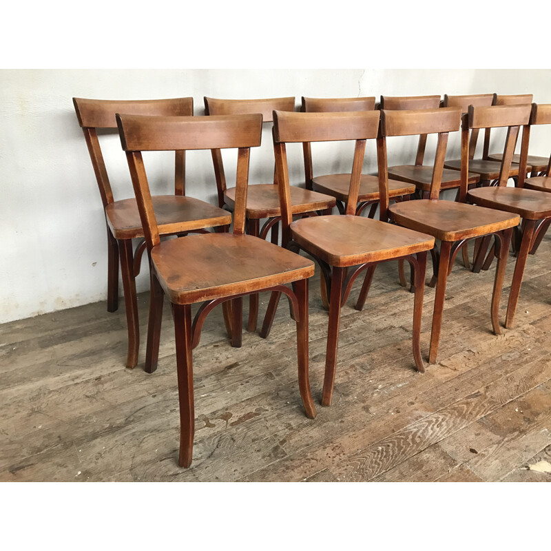 Suite de 12 chaises bistrot Baumann vintage - 1950