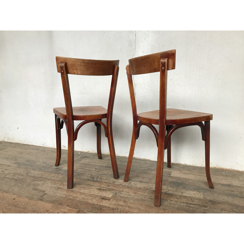 Suite de 12 chaises bistrot Baumann vintage - 1950