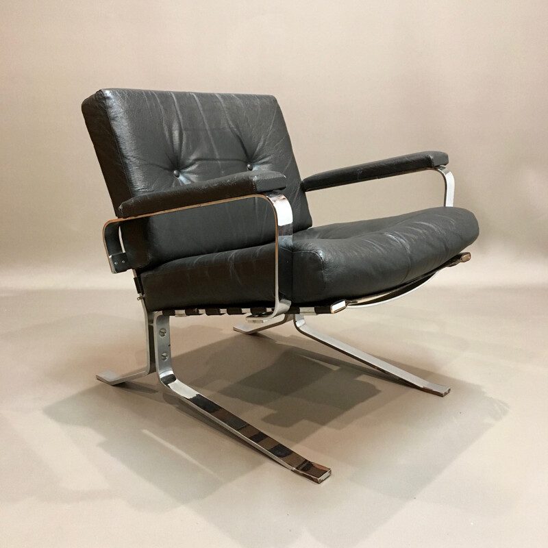 Black armchair in leather and chrome - 1960s