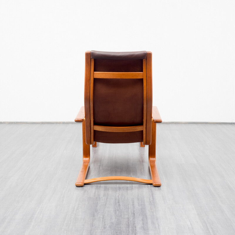 Brown leather lounge chair and ottoman, Yngve EKSTRÖM - 1950s