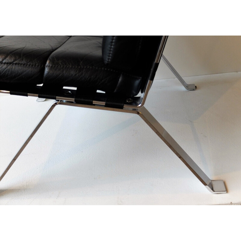 Low chair in chrome-plated steel and leather - 1960s