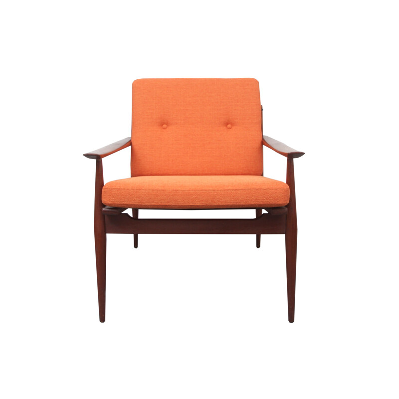 Vintage orange armchair in solid teak - 1960s