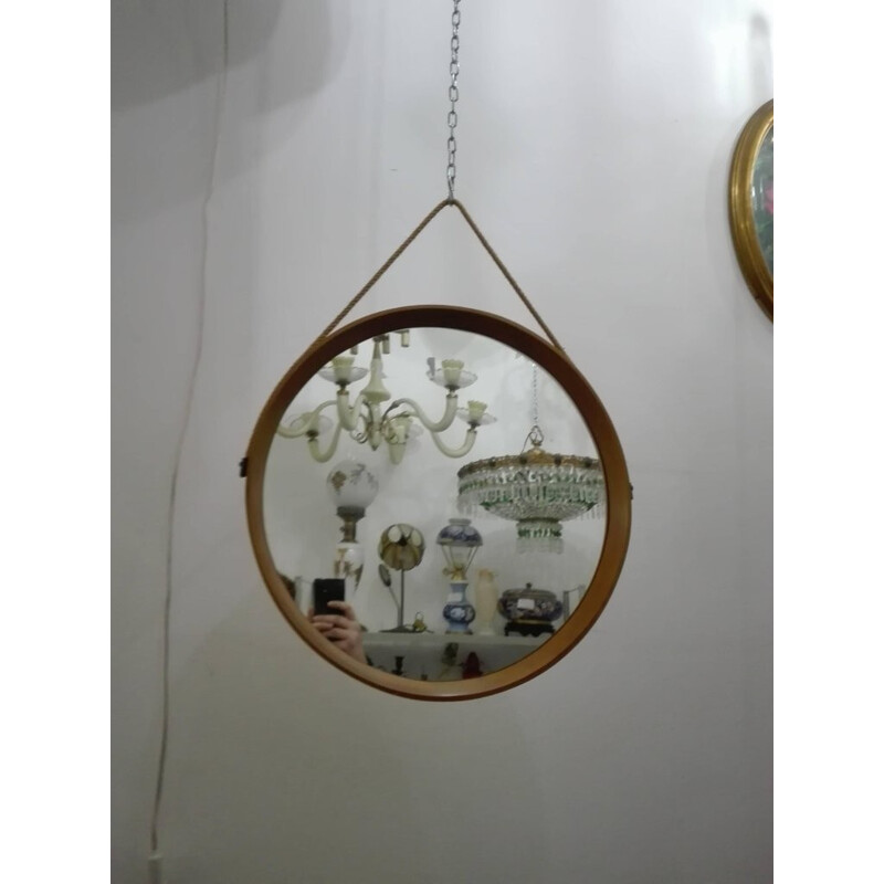 Scandinavian vintage framed wood wall mirror of circular shape by Uno and Östen Kristiansson for Luxus, 1960