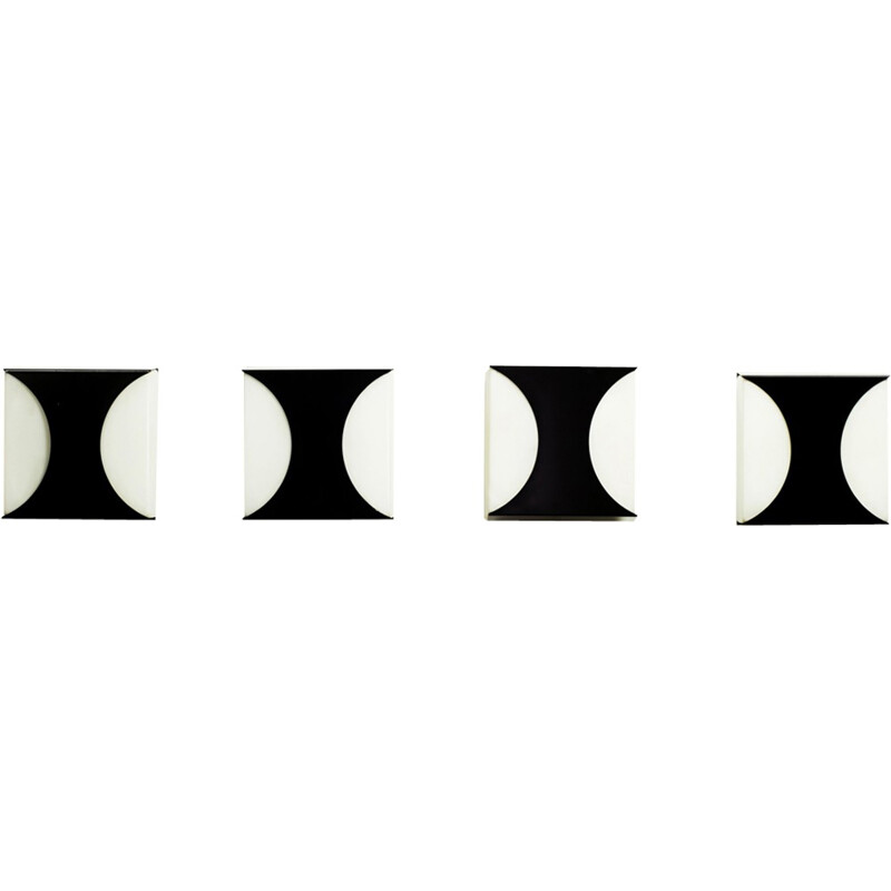 Set of 4 vintage wall lamps by Raak - 1960s