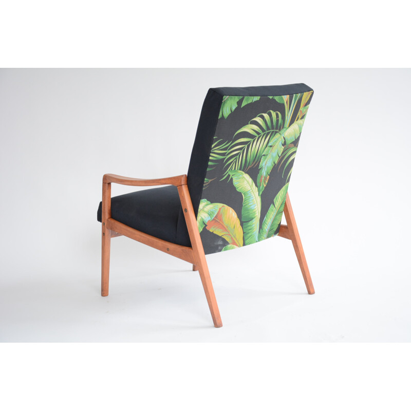 Fauteuil vintage noir avec motifs exotiques - 1960