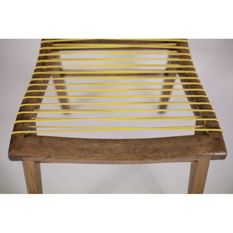 Suite de 4 chaises vintage jaunes francaises en chêne et sadroplast par Louis Sognot - 1955
