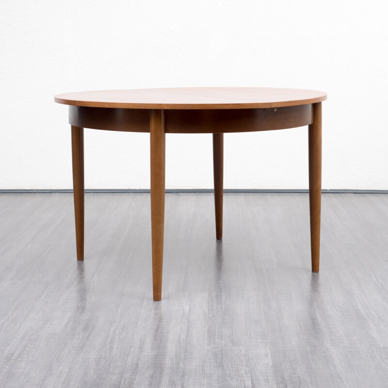 Vintage round dining table in walnut - 1960s