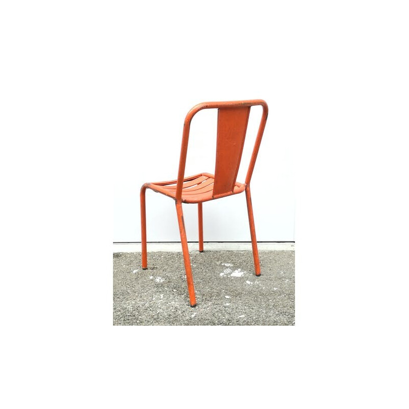 Chaise vintage "tolix T4" en métal orange par Xavier Pauchard - 1960