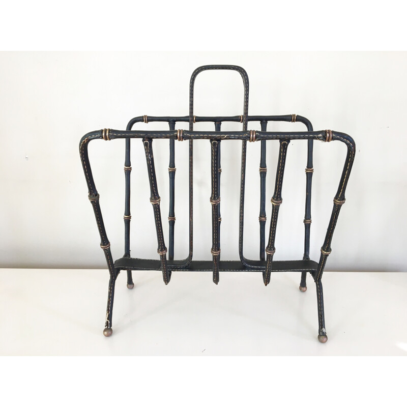Magazine rack in saddle stitched black leather and brass  by Jacques Adnet - 1950s