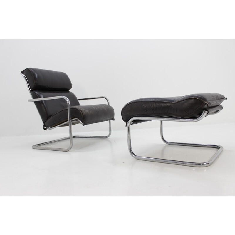 Suite de fauteuil et repose-pieds vintage en cuir - 1950