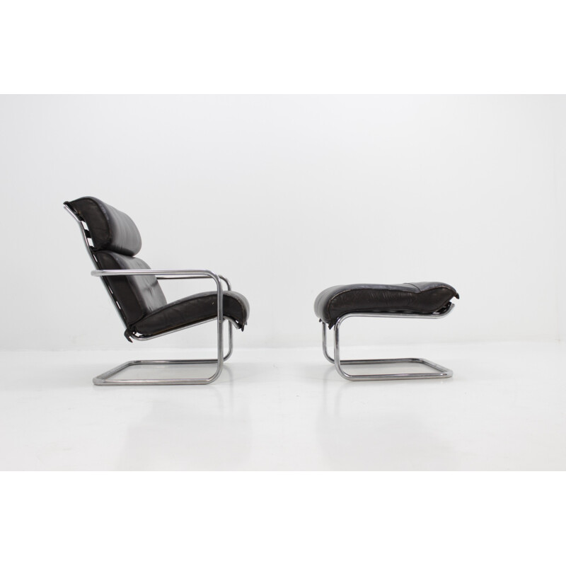 Suite van vintage lederen fauteuils en voetsteunen - 1950