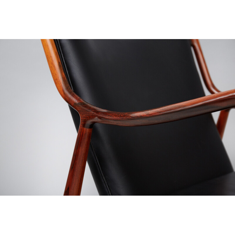 Vintage FJ-45 armchair in rosewood and leather by Finn Juhl - 1960s