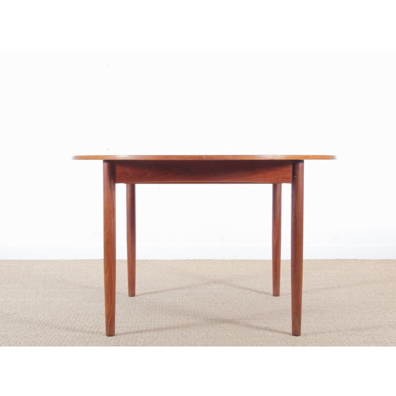 Scandinavian round teak dining table with 2 extensions 410 people