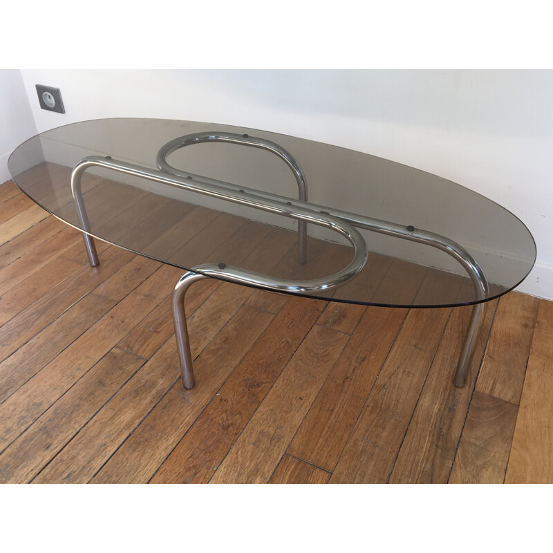 Vintage oval coffee table in glass and chrome - 1970s